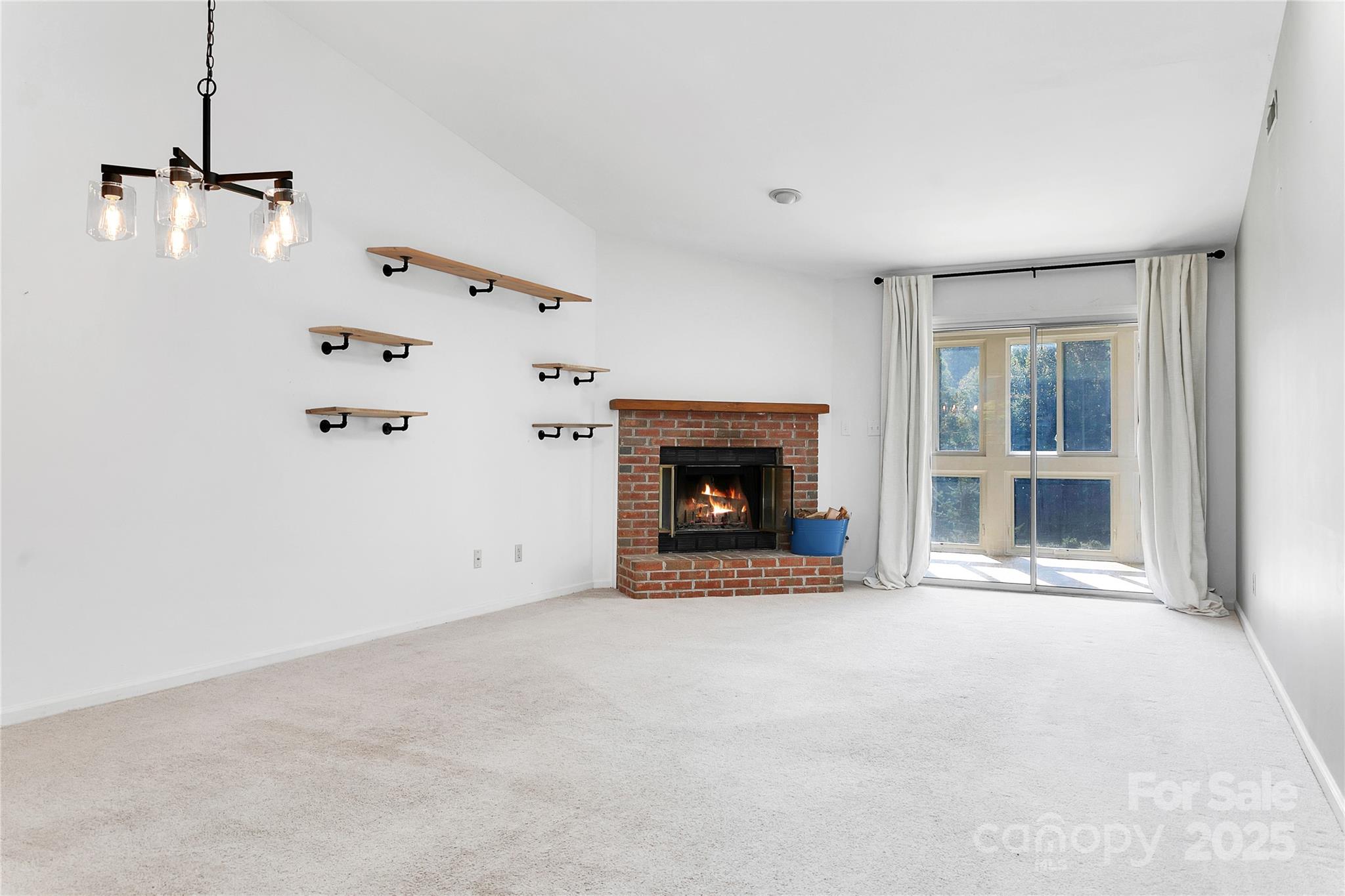 110 Lakeview Court Brevard, NC 28712 - Photo 8 of 30 a view of a livingroom with a fireplace