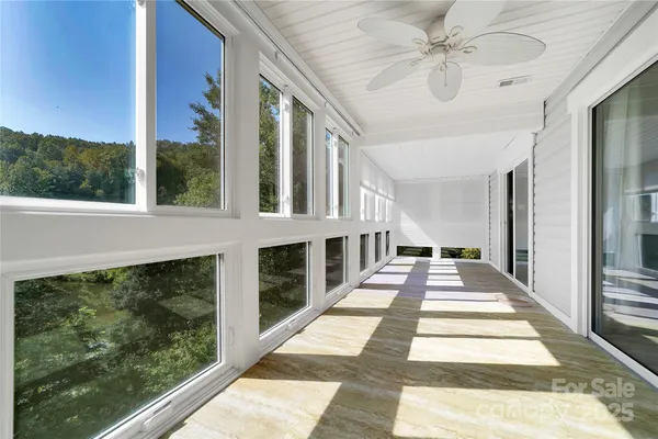 a view of a balcony and front door
