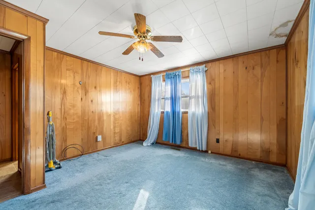a bathroom with a sink toilet and mirror