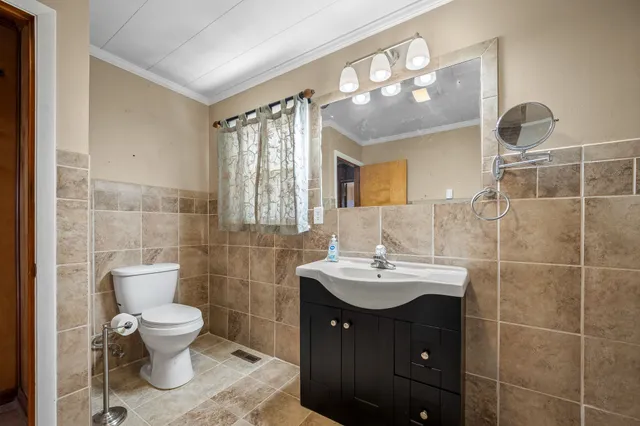 a view of a house with a yard and swimming pool