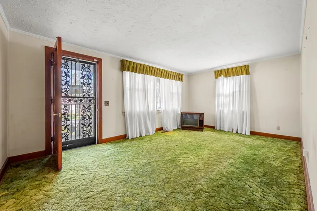 a view of an empty room with window