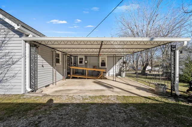a view of a house with a street