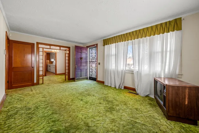 a view of an empty room with window