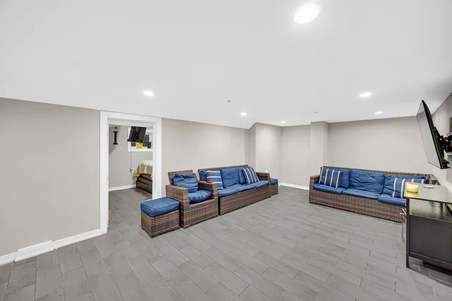 a living room with furniture and a couch