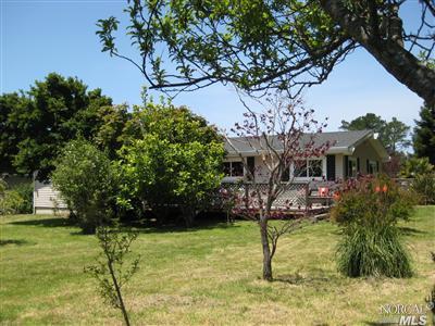 100 Mesa Road Point Reyes Station, CA 94956 - Photo 1 of 1 a view of an house with backyard porch and garden