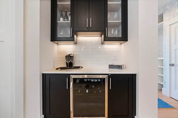 a kitchen with a sink and cabinets