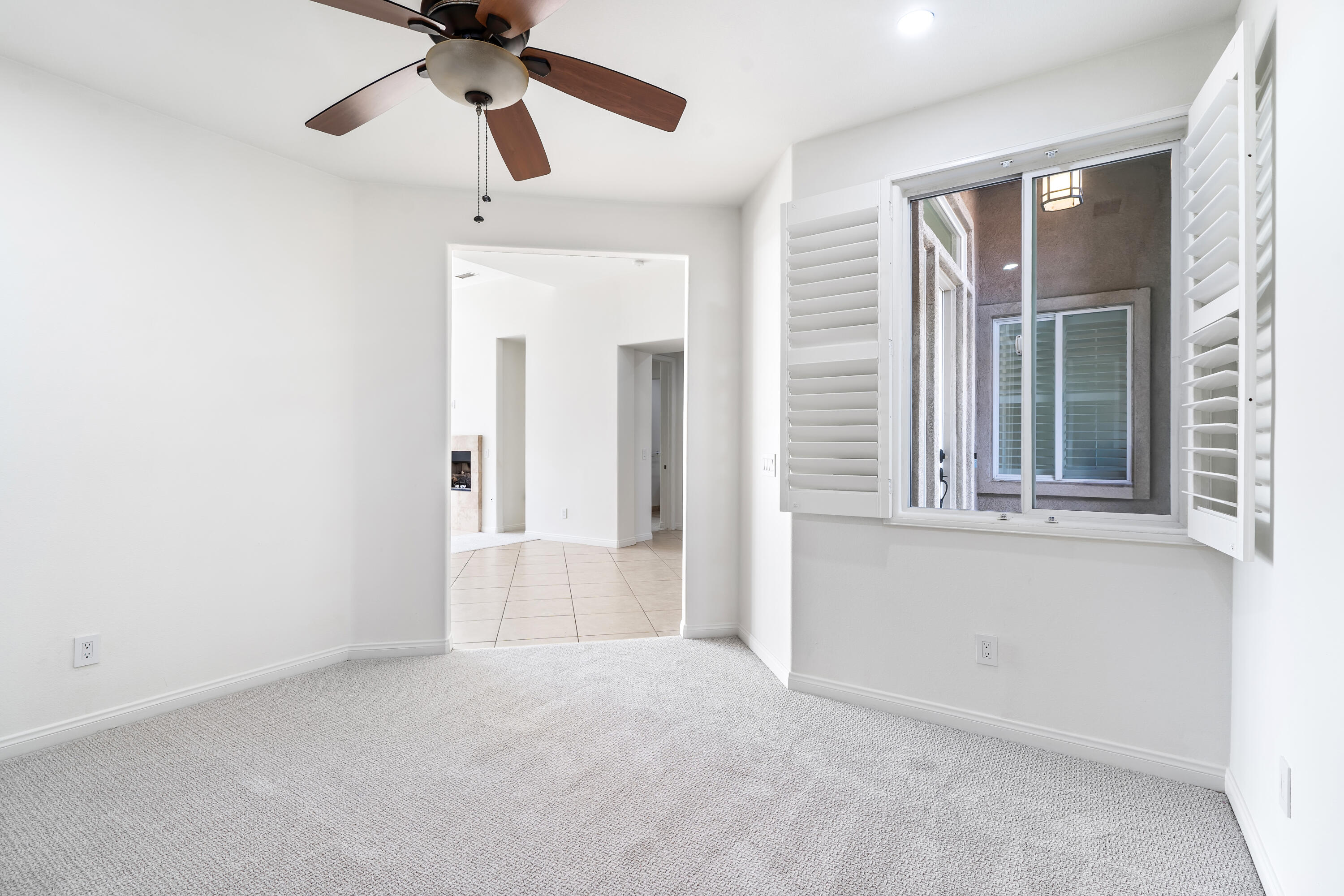 9580 Congressional Road Desert Hot Springs, CA 92240 - Photo 15 of 61 a view of an empty room with a window