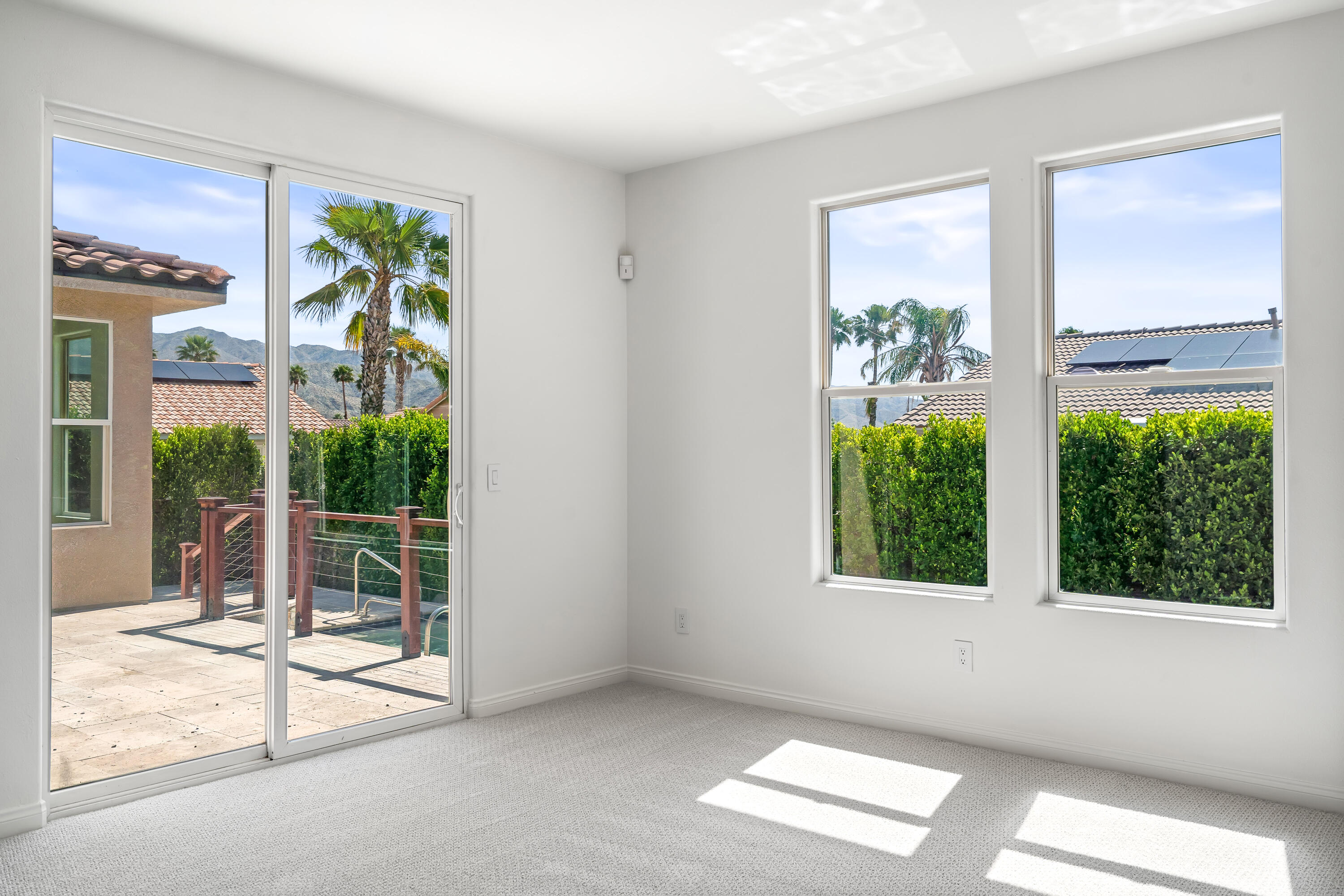 9580 Congressional Road Desert Hot Springs, CA 92240 - Photo 18 of 61 a view of an empty room with a window