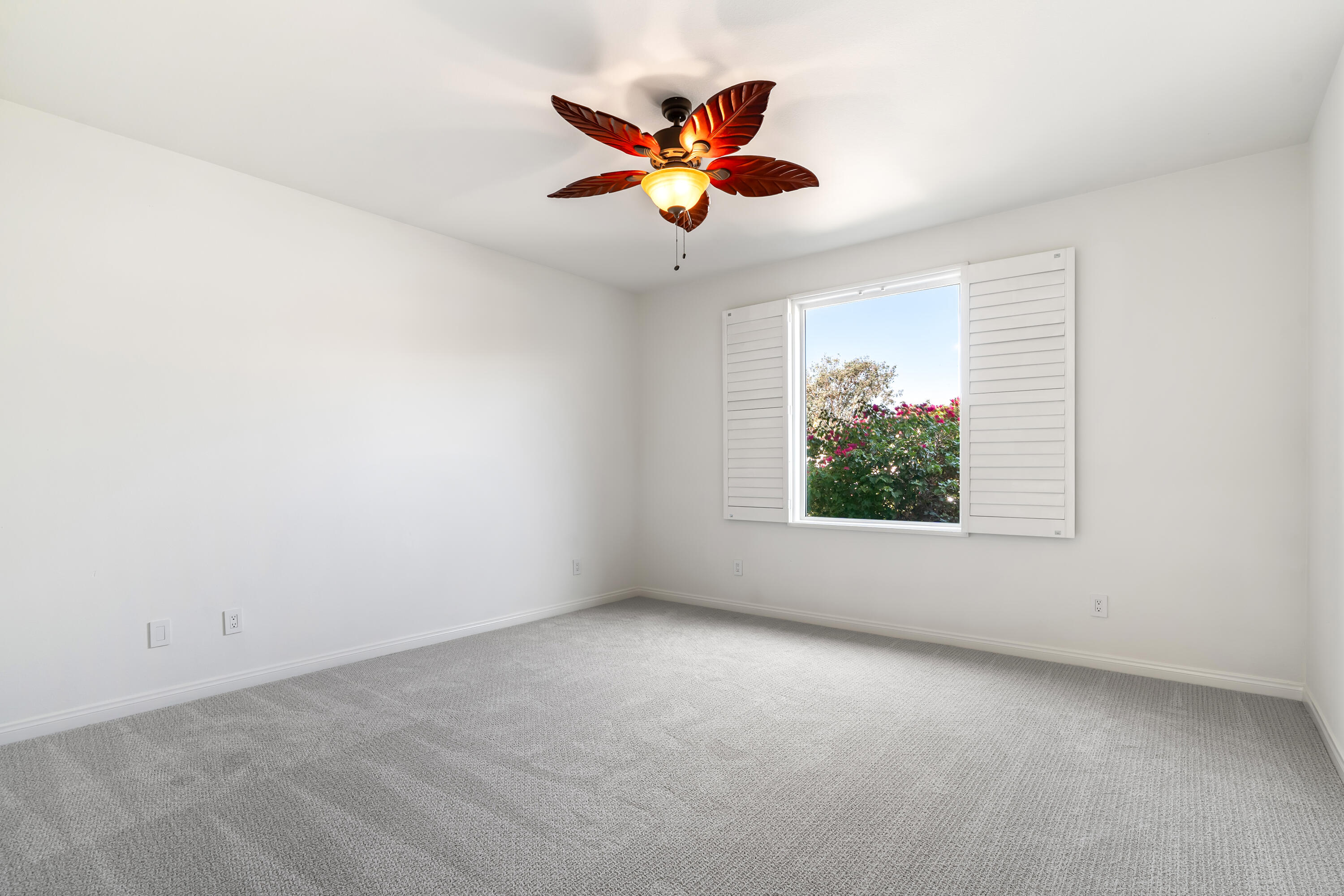 9580 Congressional Road Desert Hot Springs, CA 92240 - Photo 24 of 61 an empty room with ceiling fan and window