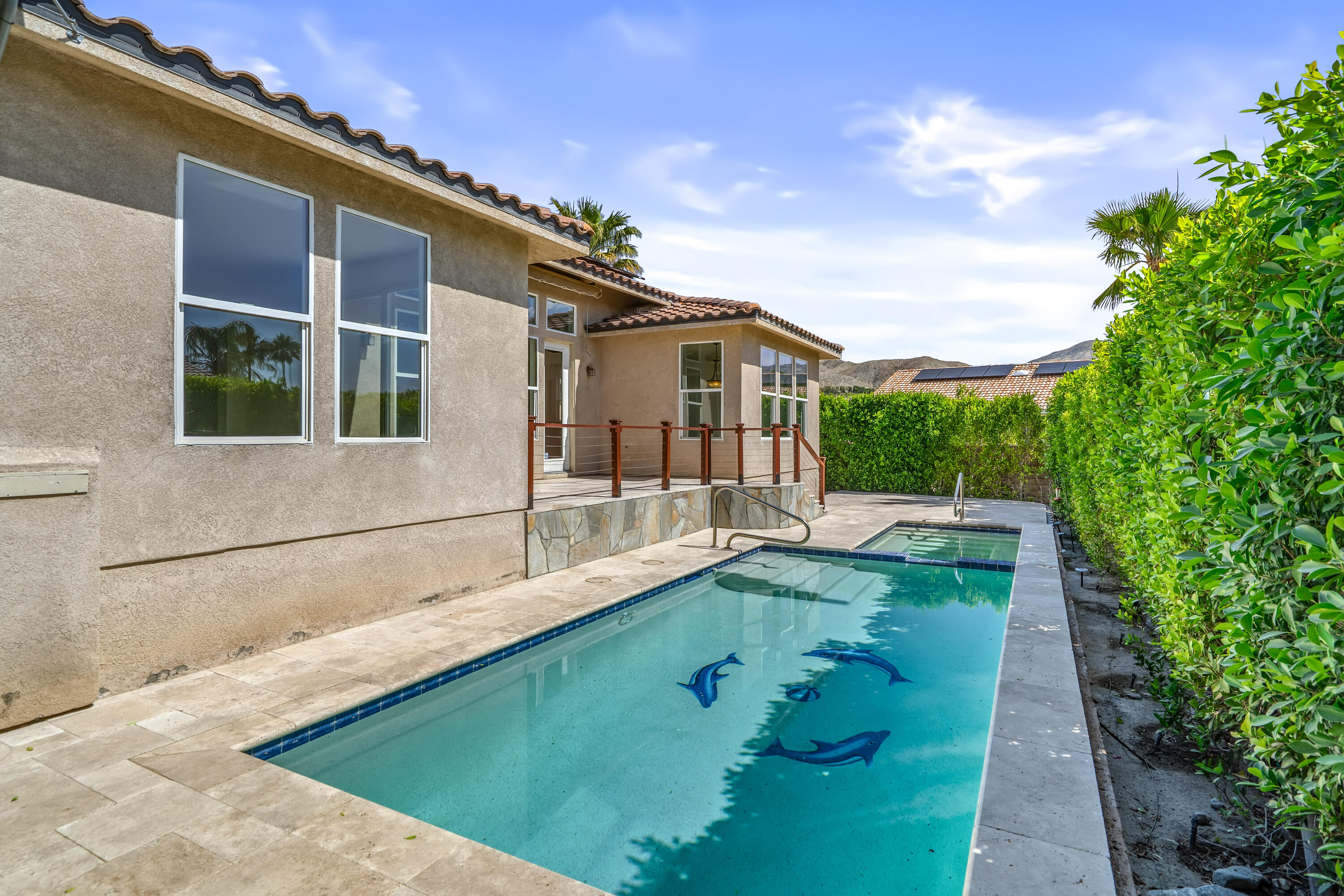 9580 Congressional Road Desert Hot Springs, CA 92240 - Photo 35 of 61 a view of house with backyard outdoor seating and barbeque oven