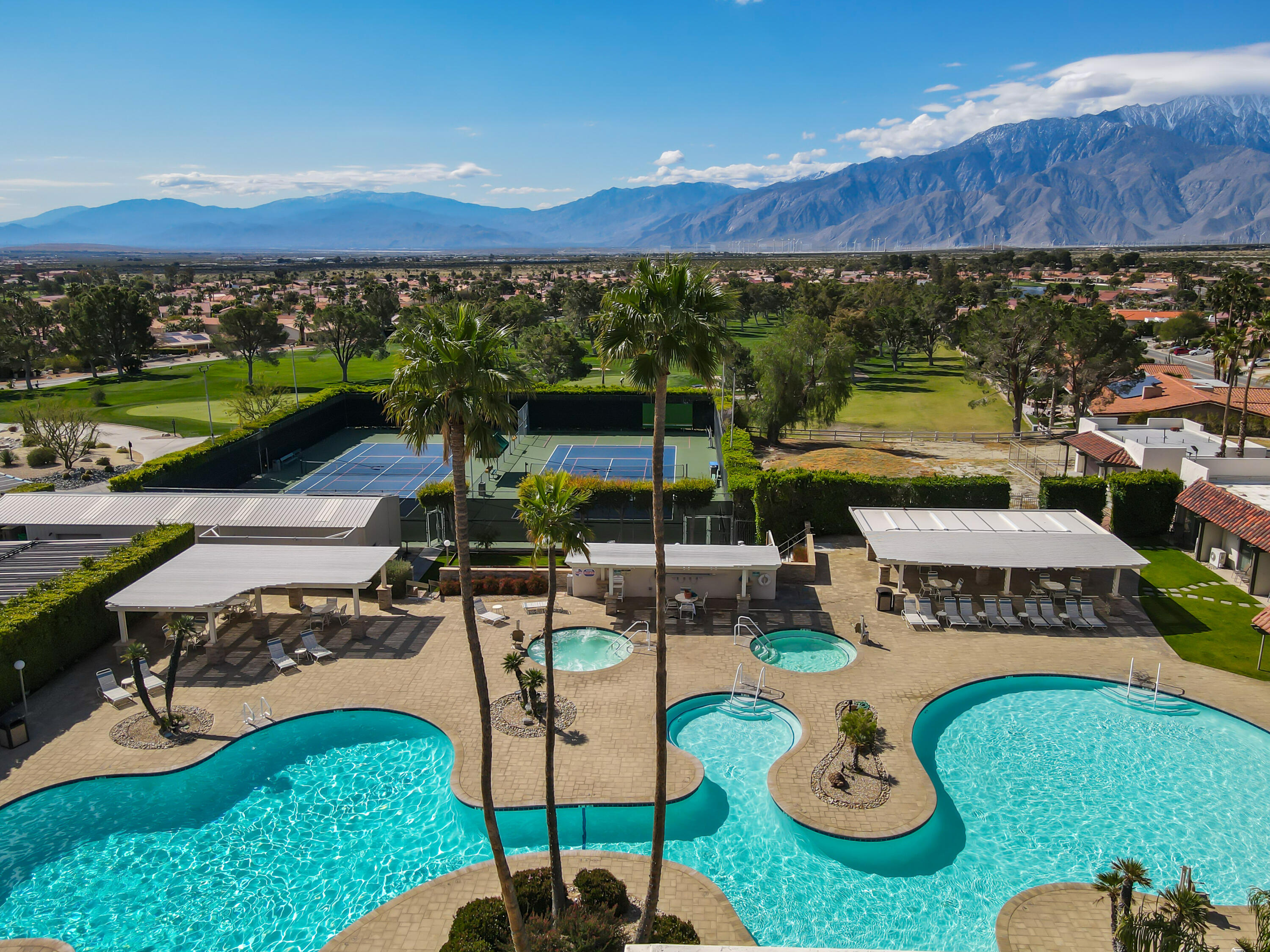 9580 Congressional Road Desert Hot Springs, CA 92240 - Photo 43 of 61 a view of a chairs and table in patio