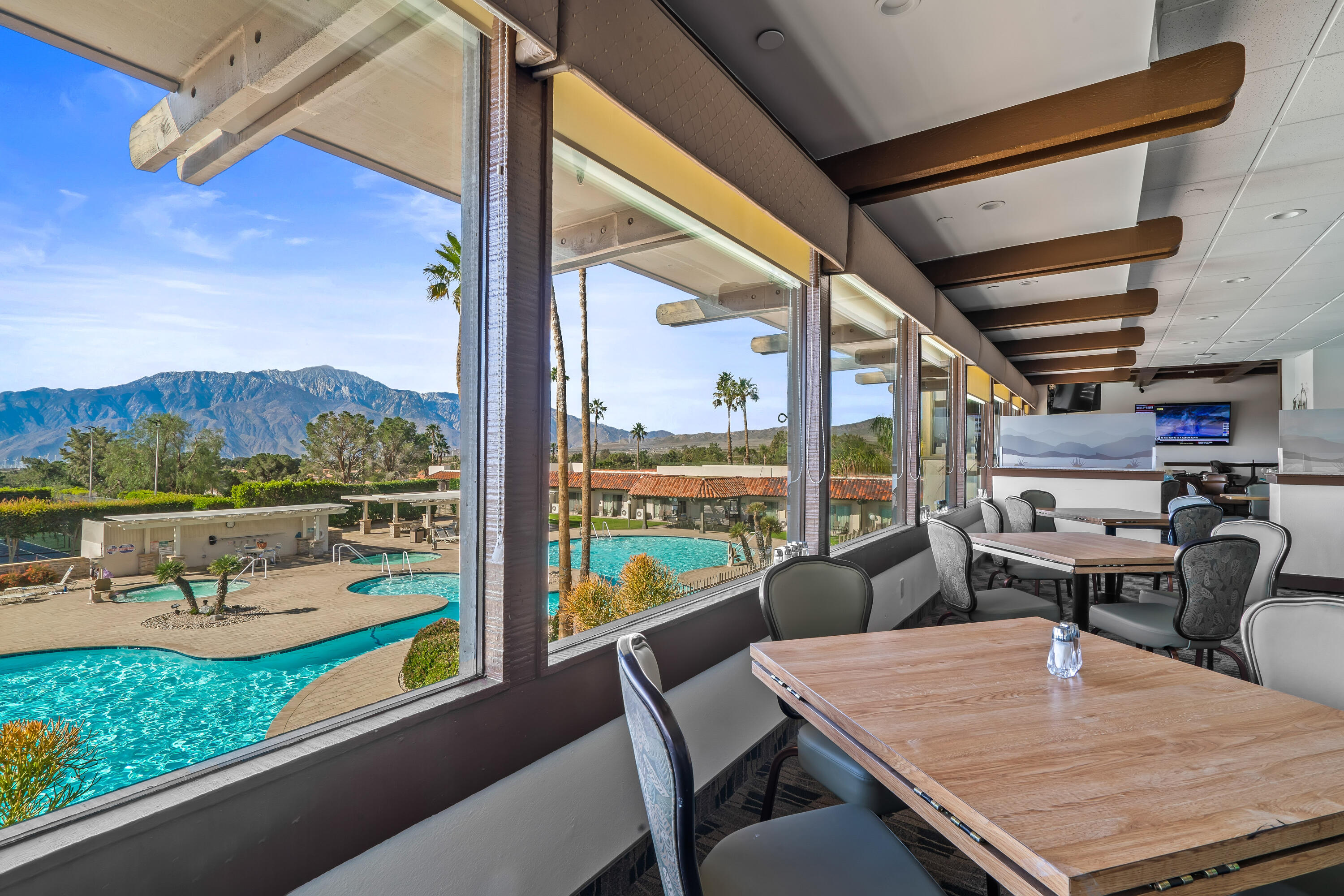 9580 Congressional Road Desert Hot Springs, CA 92240 - Photo 52 of 61 a view of a dining room with furniture window and outside view