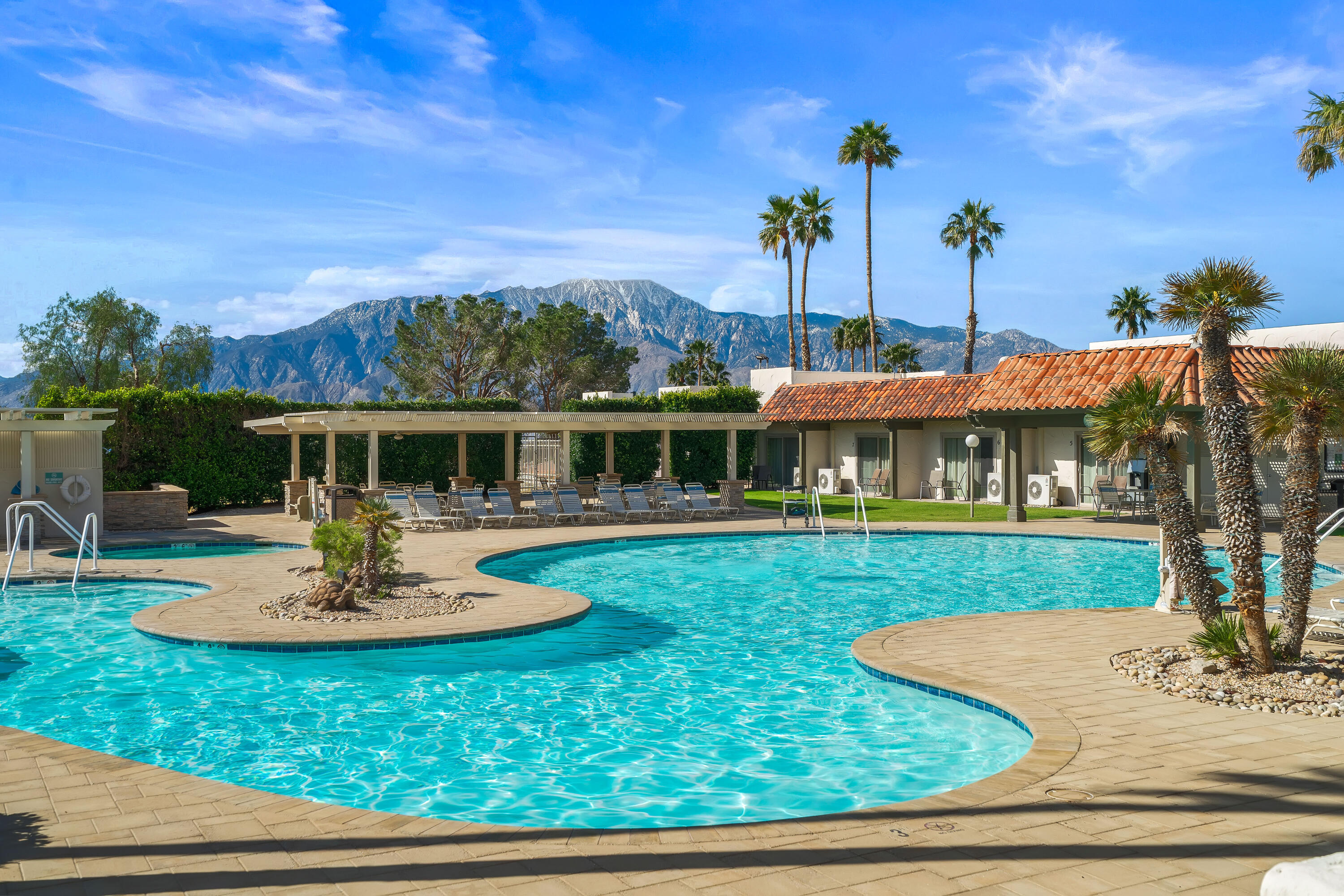 9580 Congressional Road Desert Hot Springs, CA 92240 - Photo 56 of 61 a front view of a house with garden