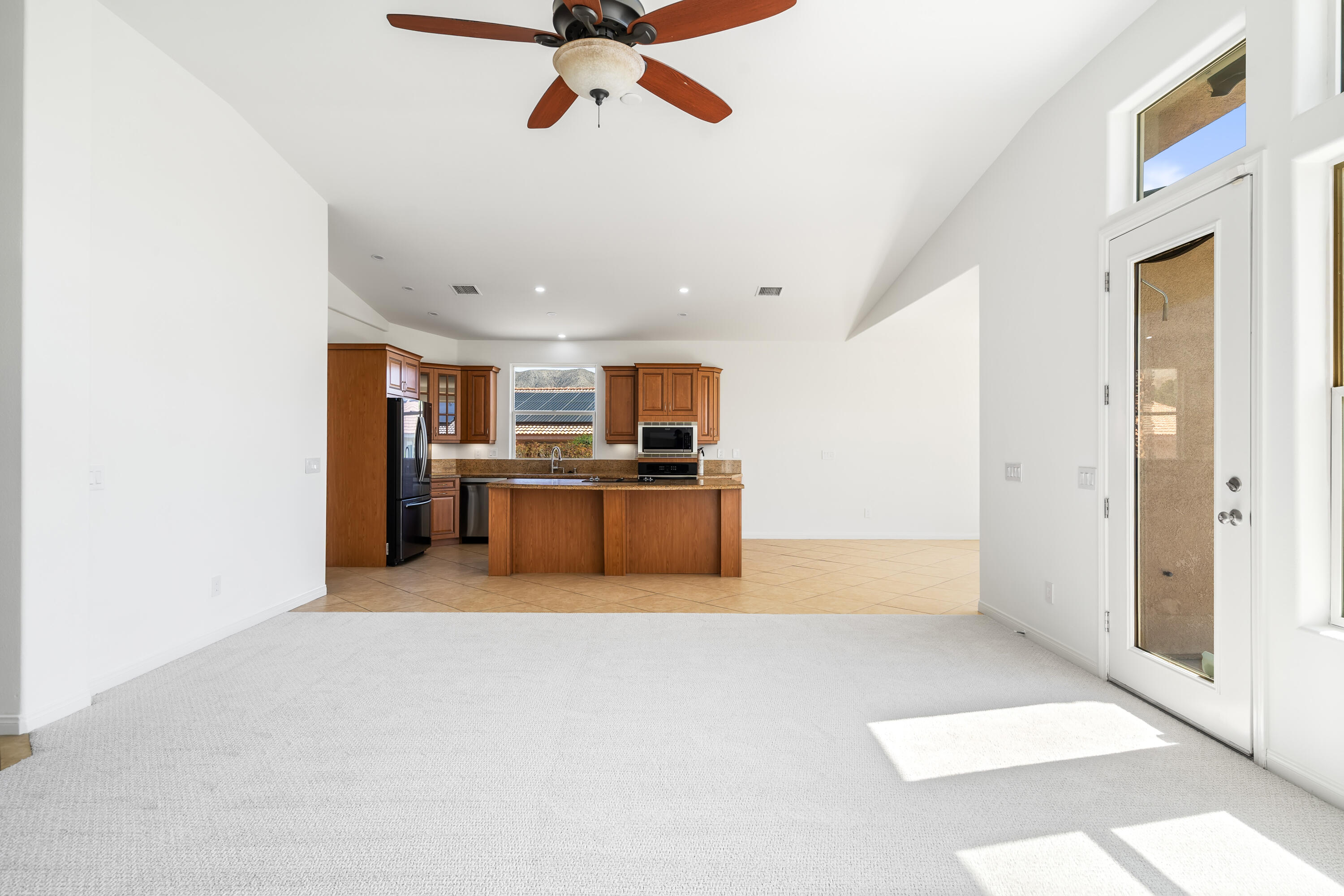 9580 Congressional Road Desert Hot Springs, CA 92240 - Photo 7 of 61 a view of kitchen with furniture and a ceiling fan