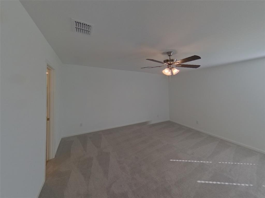 1613 Parlier Street McKinney, TX 75071 - Photo 17 of 22 a view of a room with a fan