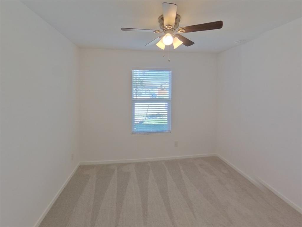 1613 Parlier Street McKinney, TX 75071 - Photo 8 of 22 an empty room with a window