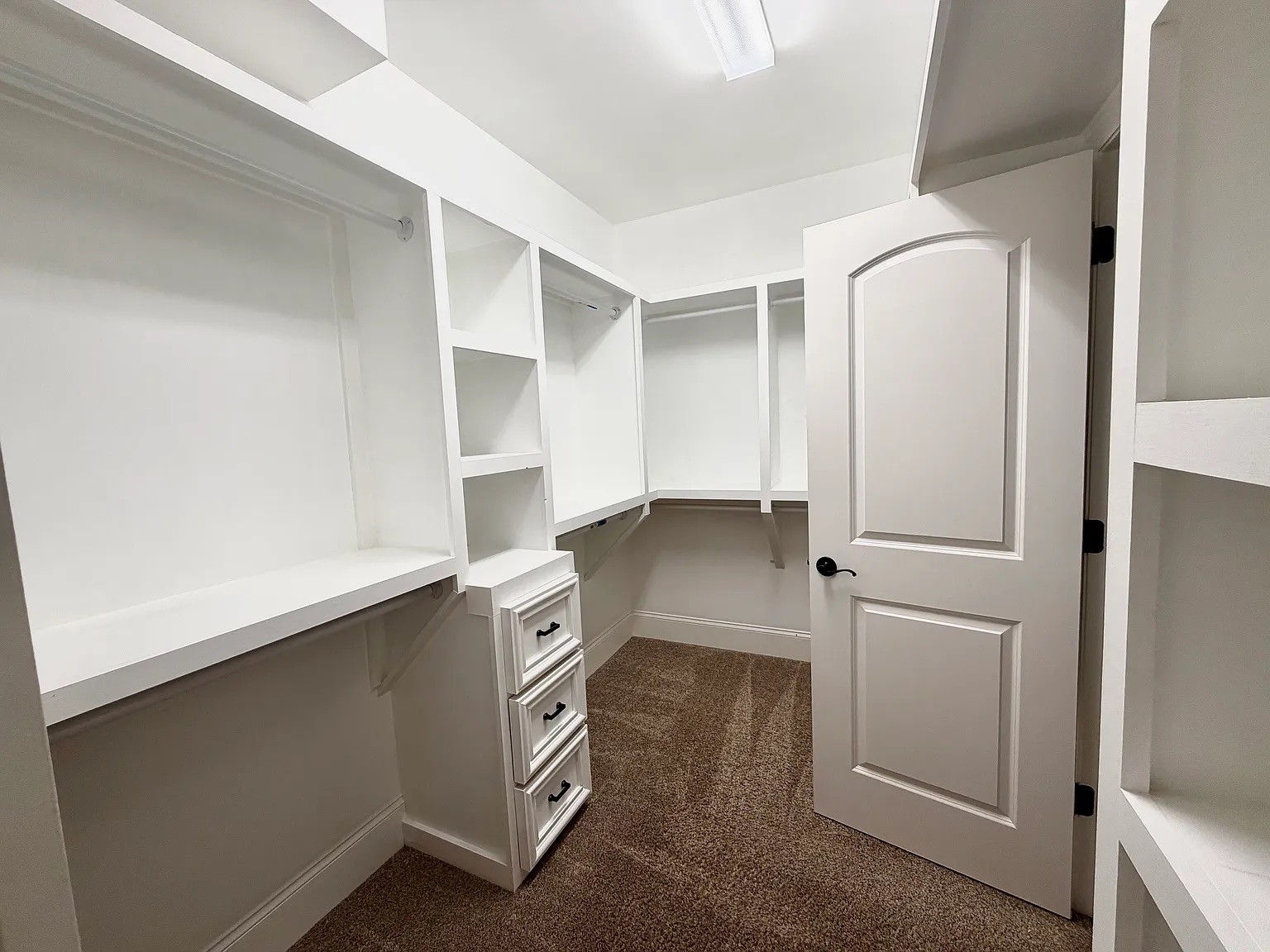 6664 Edgemoore Drive College Grove, TN 37046 - Photo 15 of 25 a view of cabinets with washer and dryer