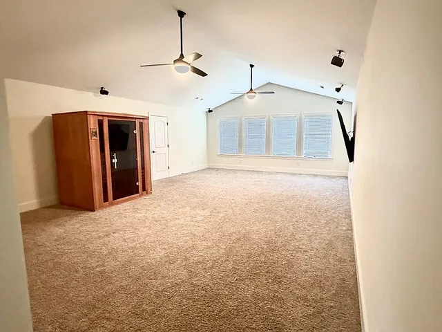 a view of a livingroom with a ceiling fan