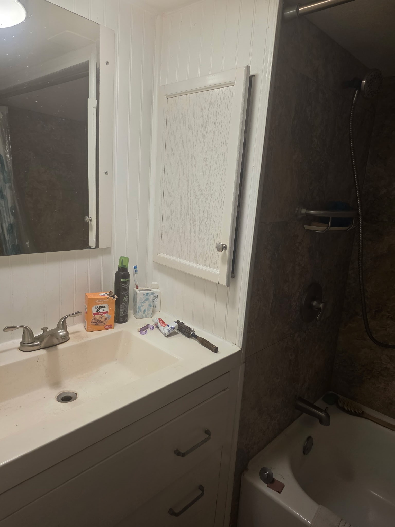 11 Pine Road Coldspring, TX 77331 - Photo 15 of 32 a bathroom with a sink and a mirror