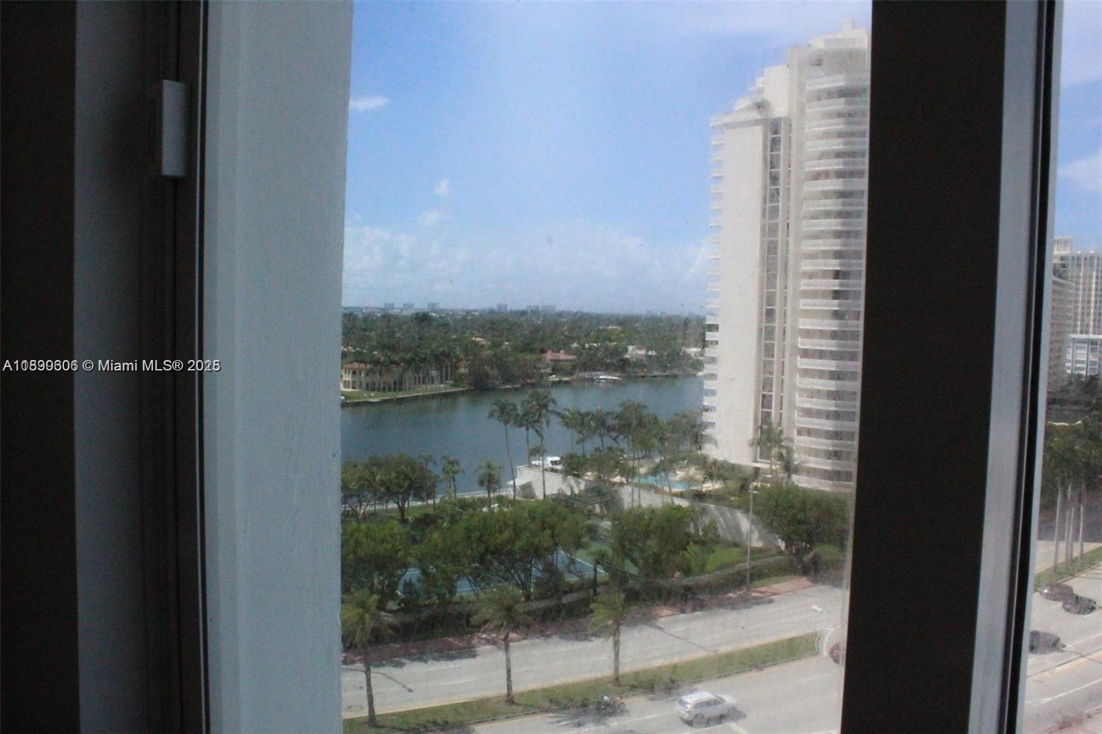 5401 Collins Avenue, Unit 819 Miami Beach, FL 33140 - Photo 21 of 40 a view of a lake from a balcony