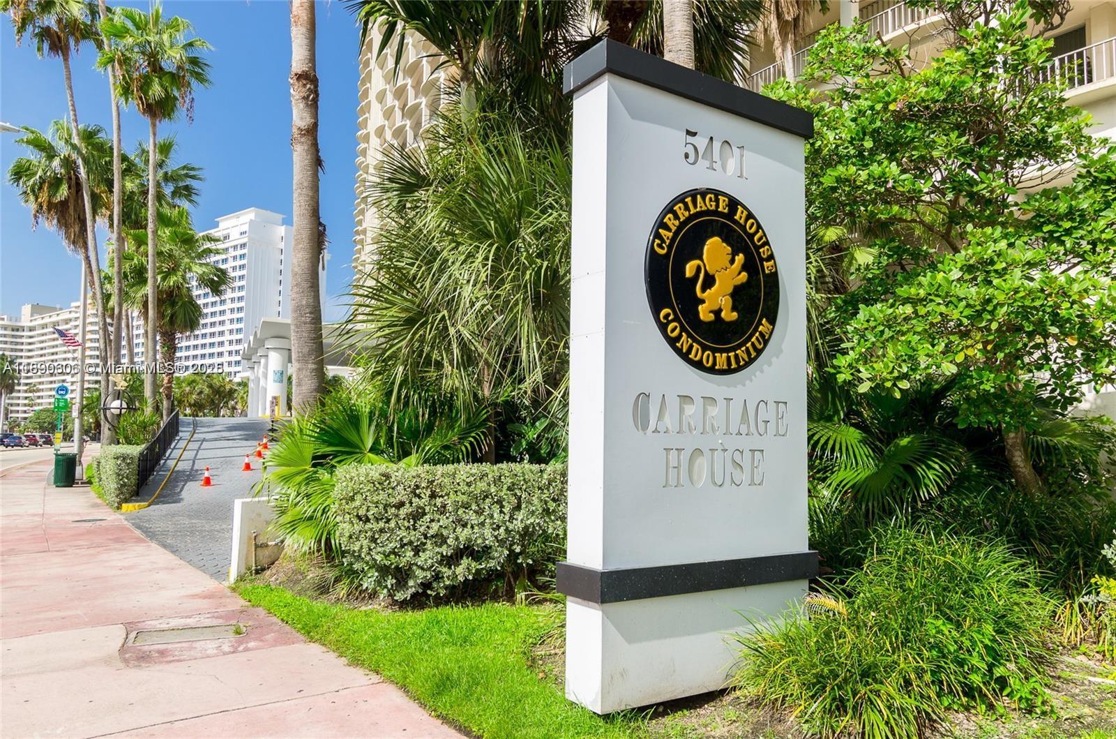 5401 Collins Avenue, Unit 819 Miami Beach, FL 33140 - Photo 3 of 40 a front view of a house with garden