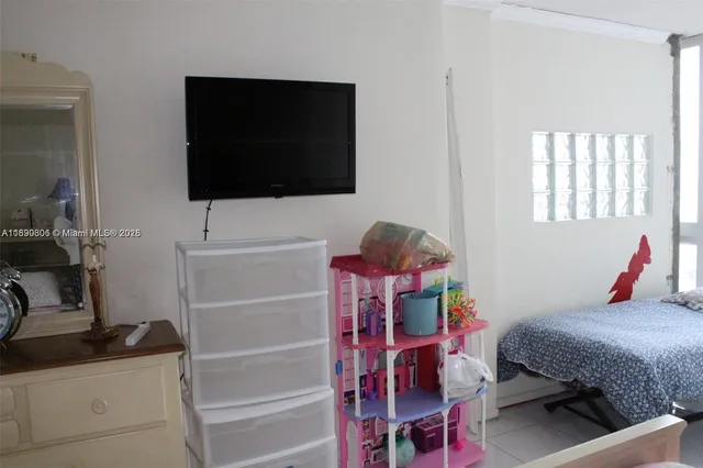 a bathroom with a sink and cabinets