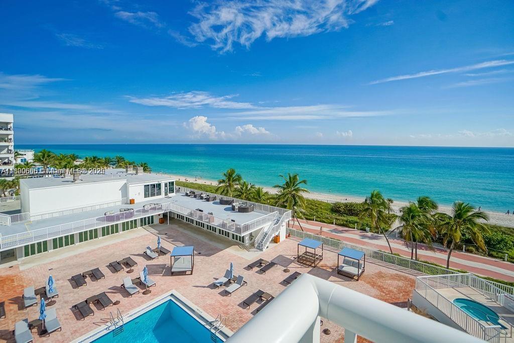 5401 Collins Avenue, Unit 819 Miami Beach, FL 33140 - Photo 8 of 40 a terrace with outdoor seating and city view
