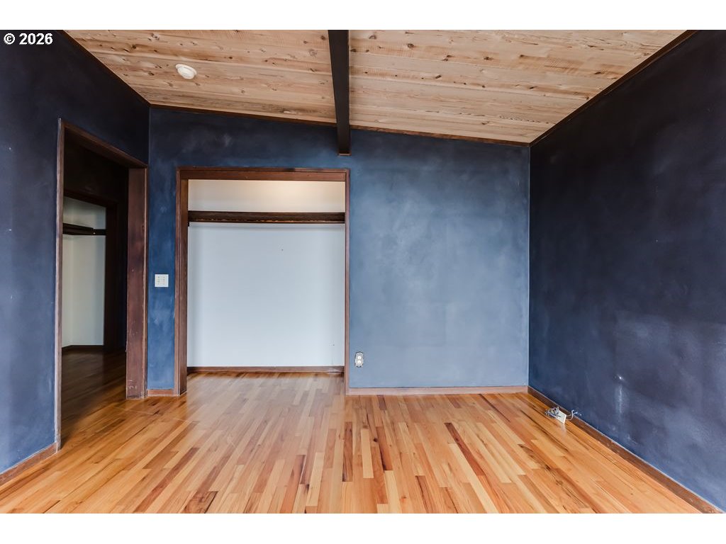 2055 Broadview Street Eugene, OR 97405 - Photo 28 of 45 a view of an empty room with wooden floor and closet