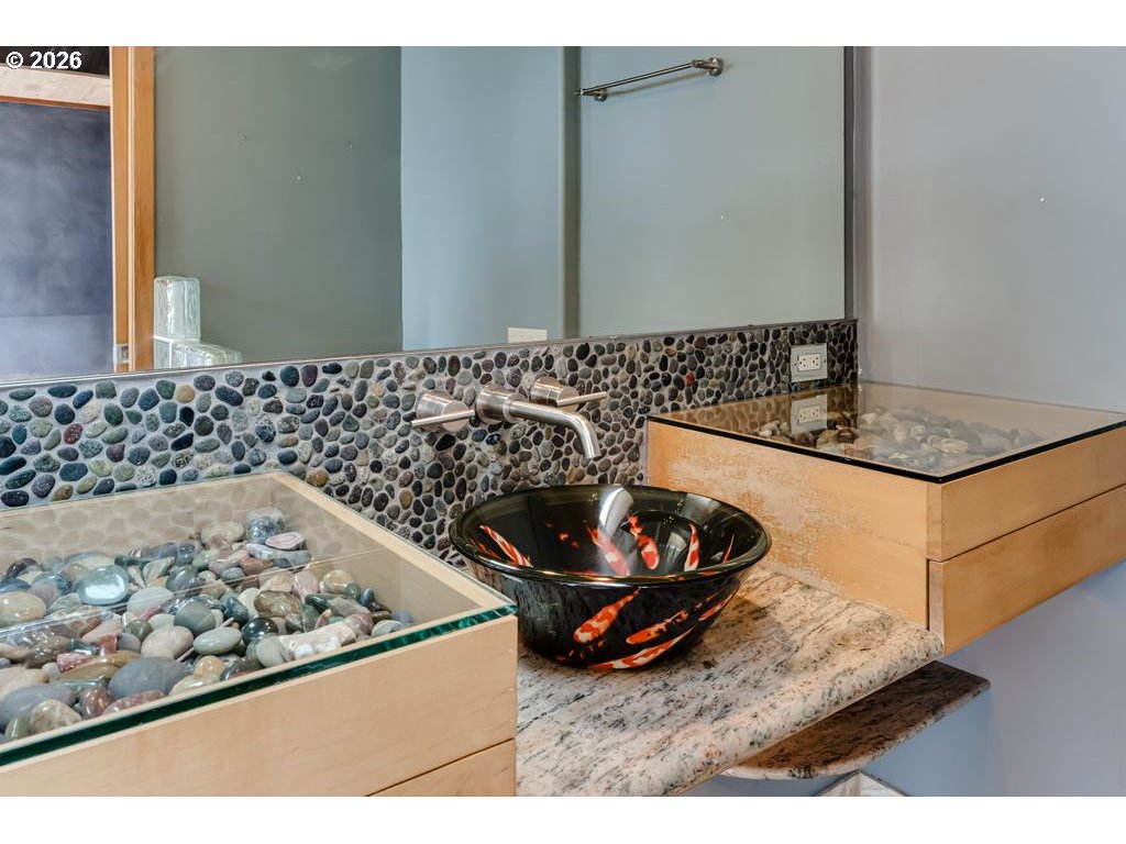 2055 Broadview Street Eugene, OR 97405 - Photo 31 of 45 a bathroom with a granite countertop sink and a mirror