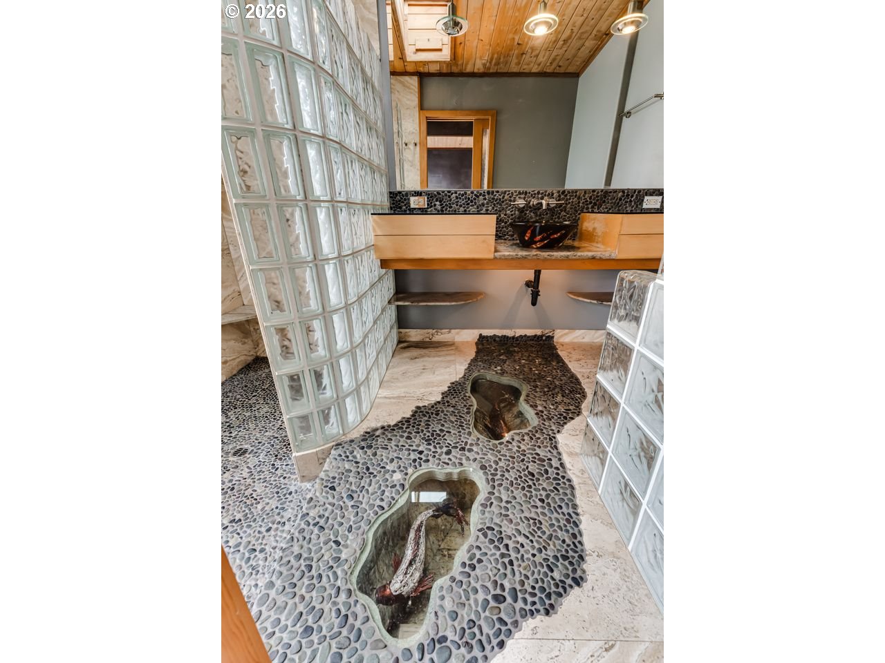 2055 Broadview Street Eugene, OR 97405 - Photo 32 of 45 a living room with furniture and a fireplace