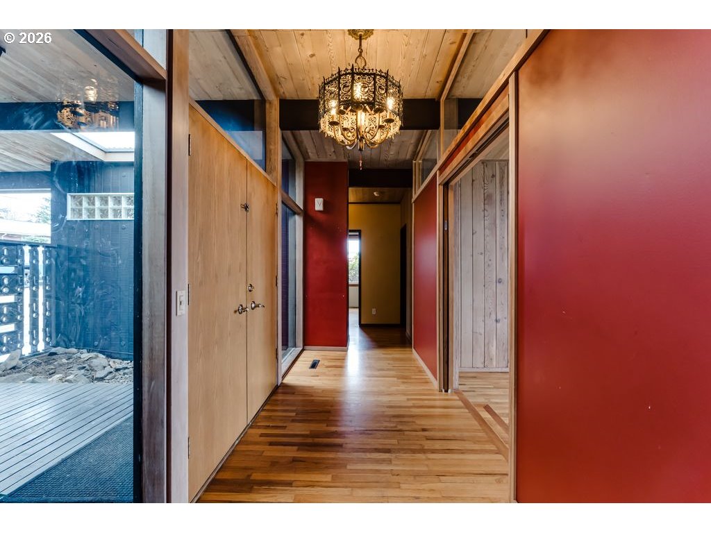 2055 Broadview Street Eugene, OR 97405 - Photo 4 of 45 a view interior of a house with hallway closet and chandelier