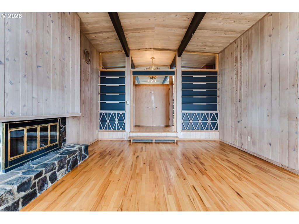 2055 Broadview Street Eugene, OR 97405 - Photo 9 of 45 a view of an empty room with wooden floor and a window