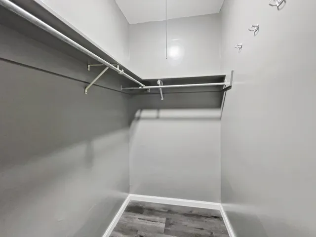 a view of a room with racks on the wall