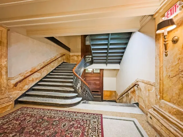 a view of entryway with a front door