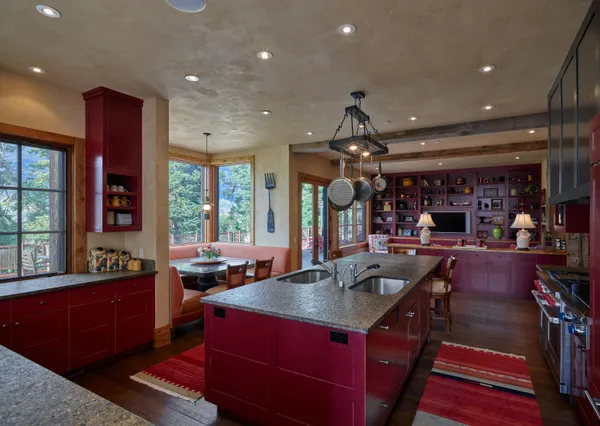 a living room with lots of furniture and window