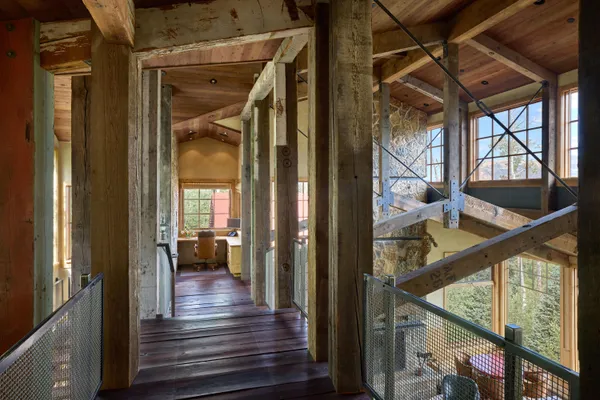 a view of a balcony with wooden floor