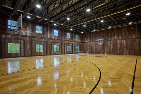 a view of a lush green hillside and a houses