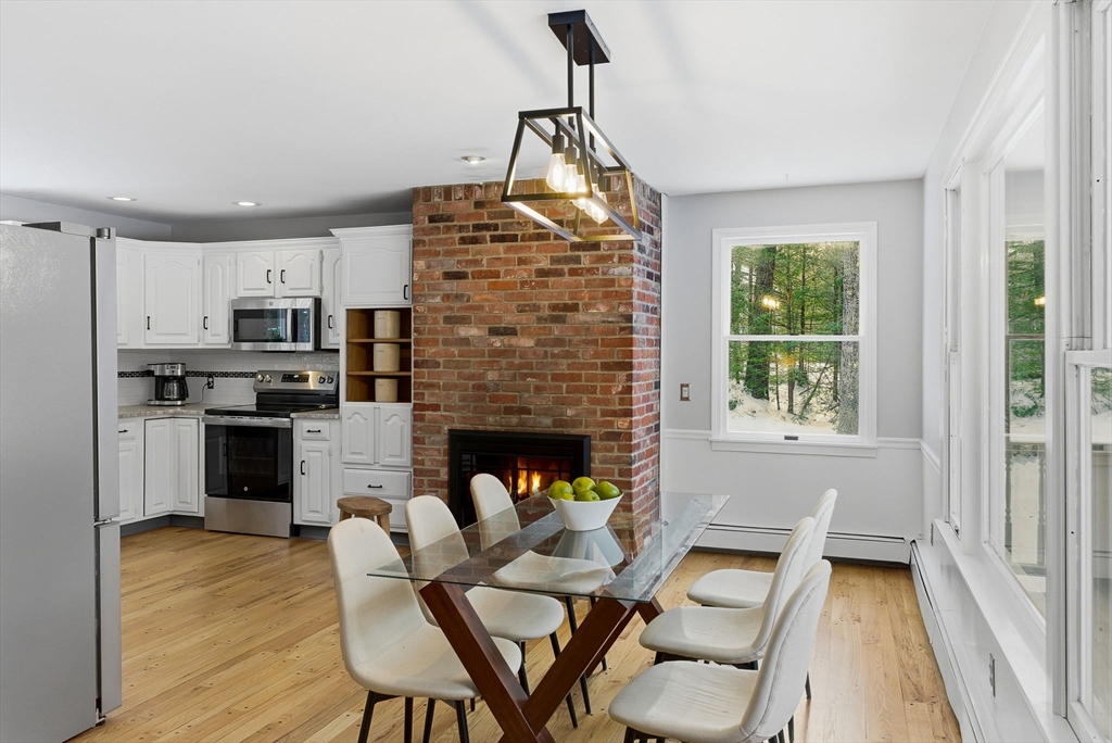 75 Barre Road Hubbardston, MA 01452 - Photo 11 of 42 a living room with furniture and a fireplace