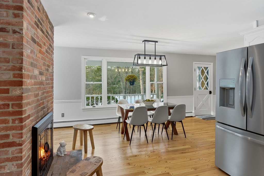 75 Barre Road Hubbardston, MA 01452 - Photo 13 of 42 a view of a dining room with furniture window and outside view