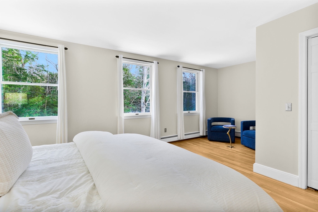 75 Barre Road Hubbardston, MA 01452 - Photo 34 of 42 a bedroom with a bed and a window