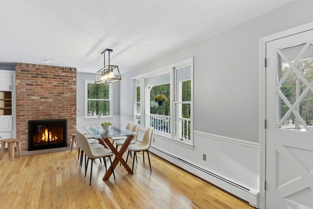 75 Barre Road Hubbardston, MA 01452 - Photo 10 of 42 a dining room with furniture window and wooden floor