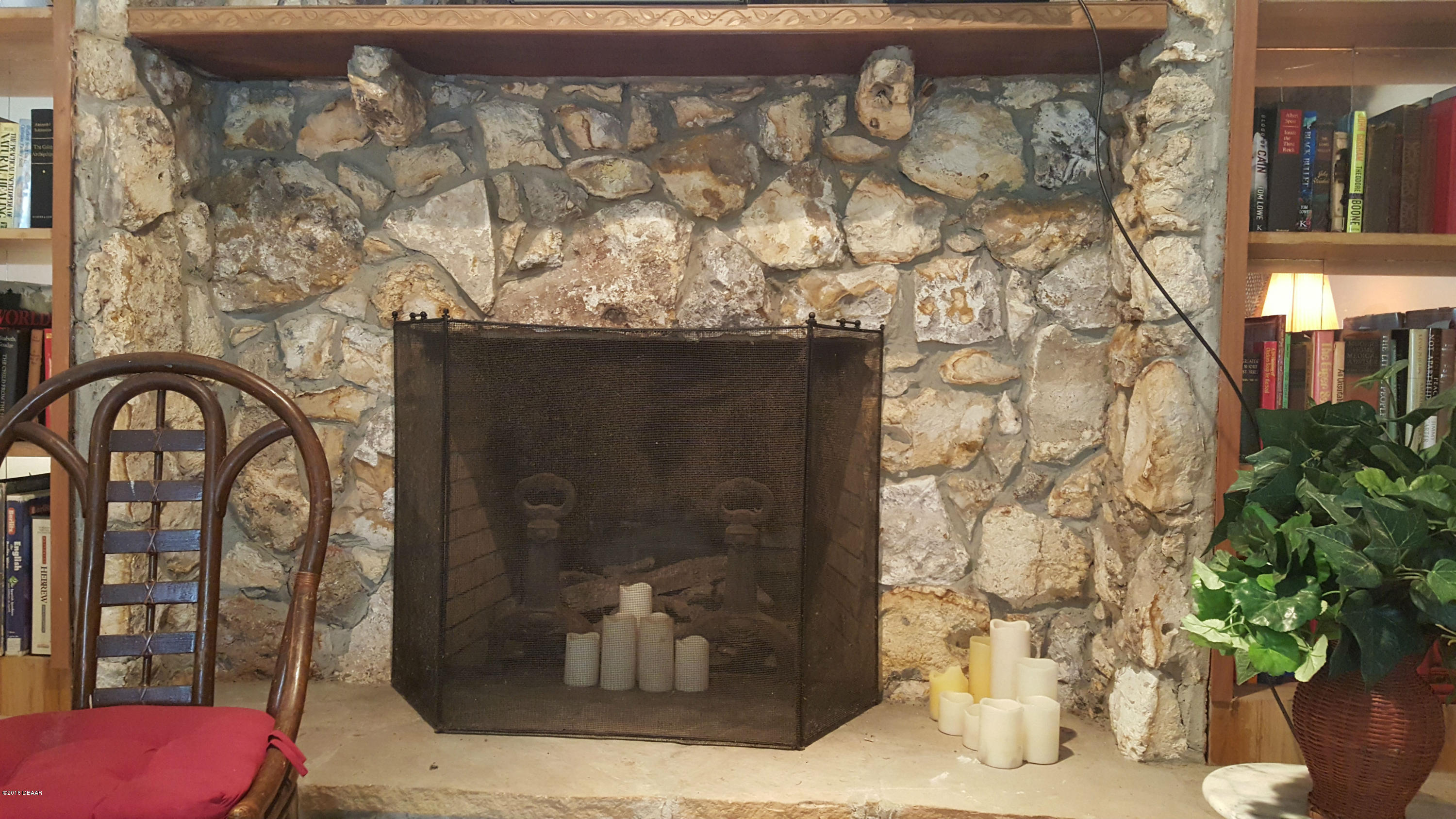53 Jennifer Circle Ponce Inlet, FL 32127 - Photo 11 of 26 Custom Stone Wood Burning Fireplace