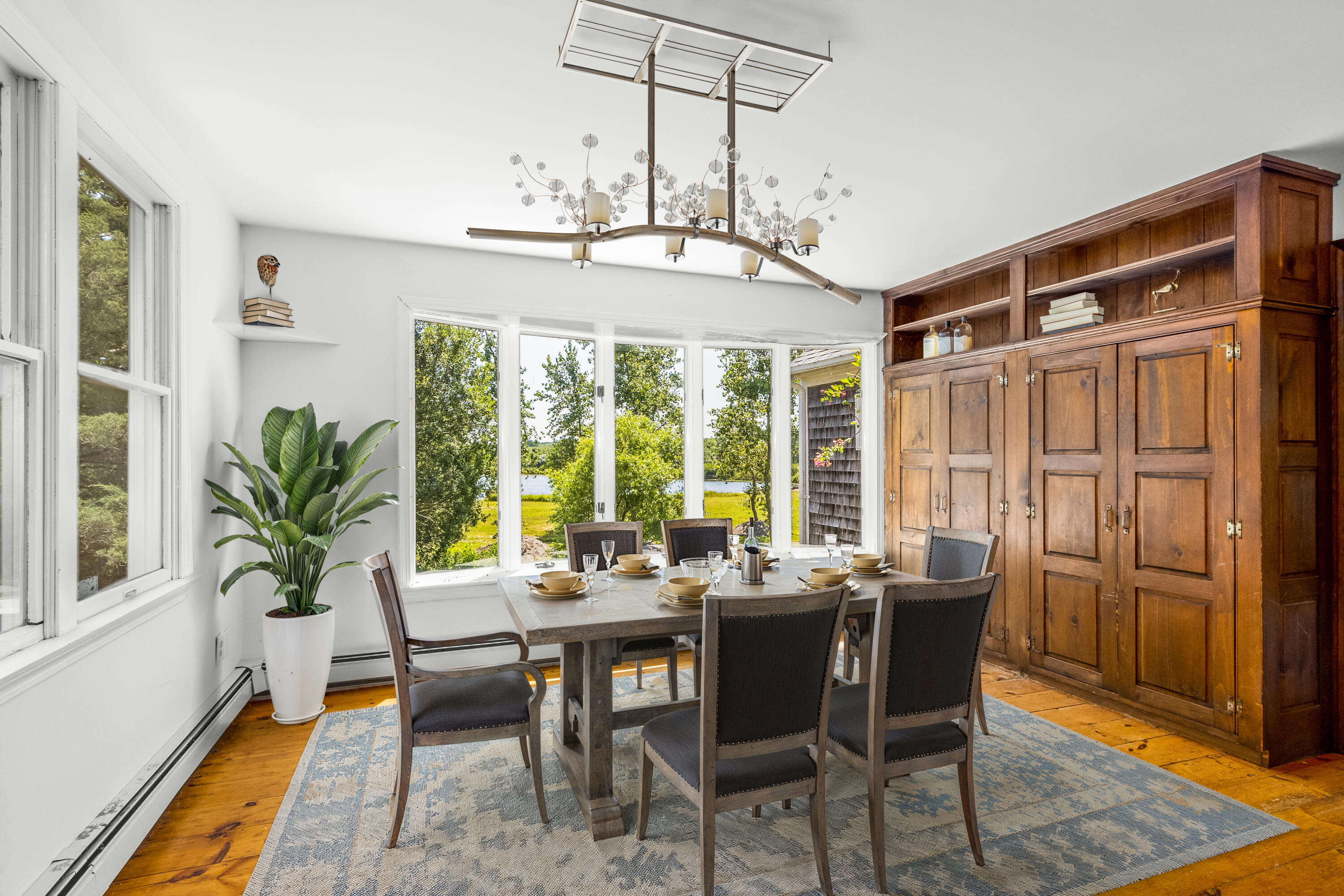 32 North Shore Blvd Extension Sandwich, MA 02537 - Photo 6 of 28 a view of a dining room with furniture window and wooden floor