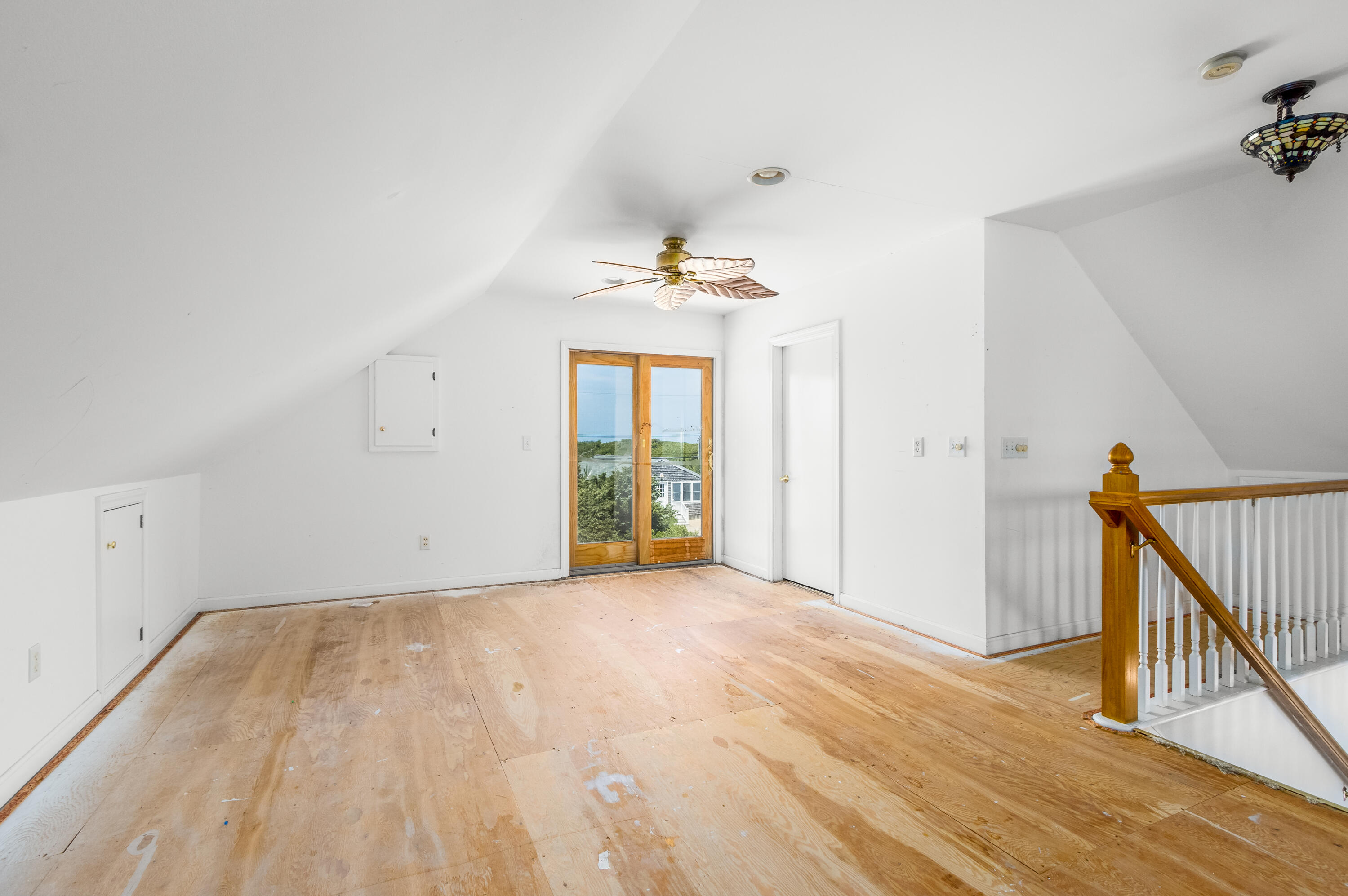 32 North Shore Blvd Extension Sandwich, MA 02537 - Photo 10 of 28 a view of an empty room with wooden floor and a window