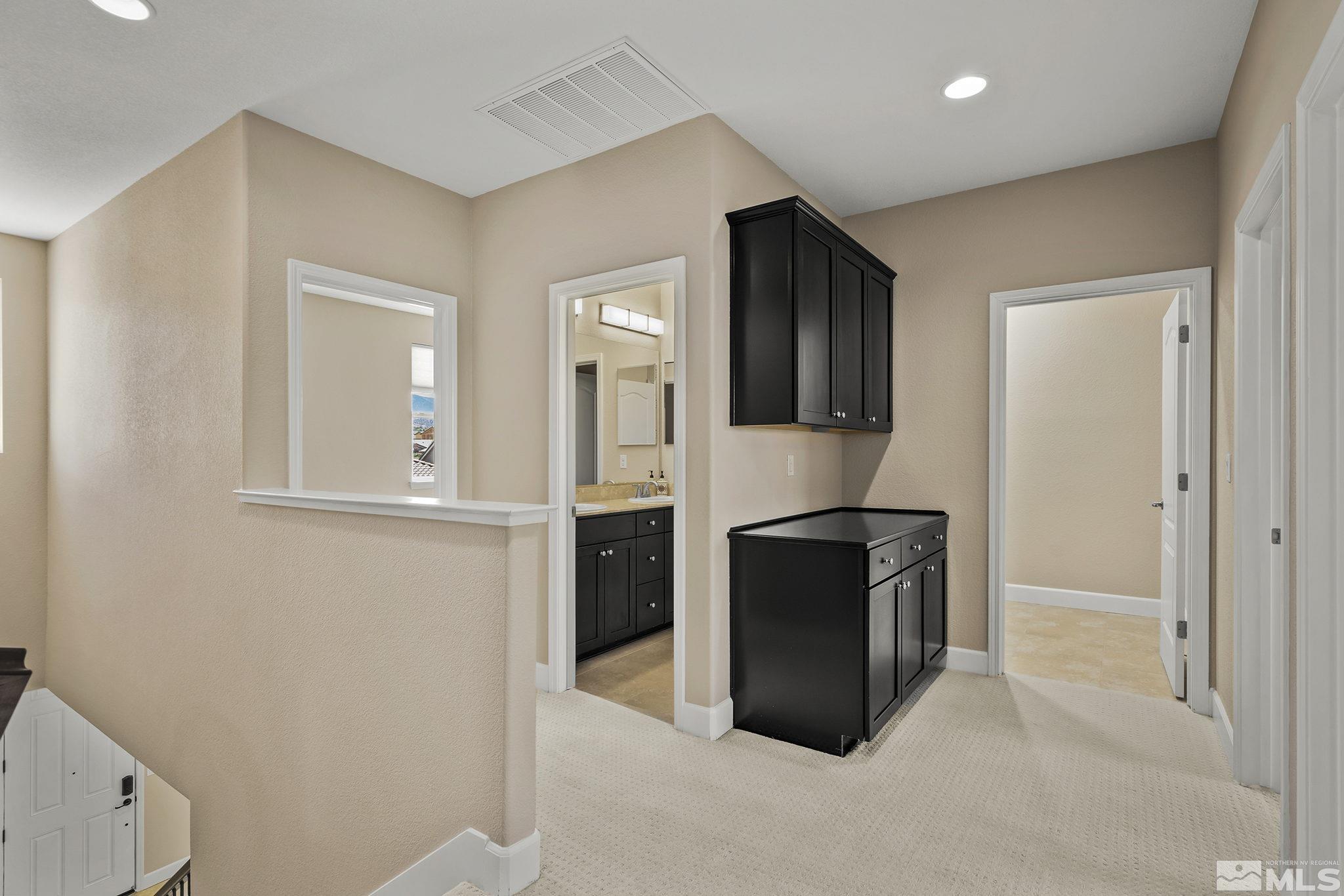 10819 Walnut Ridge Drive Reno, NV 89521 - Photo 14 of 22 a kitchen with a refrigerator and a stove