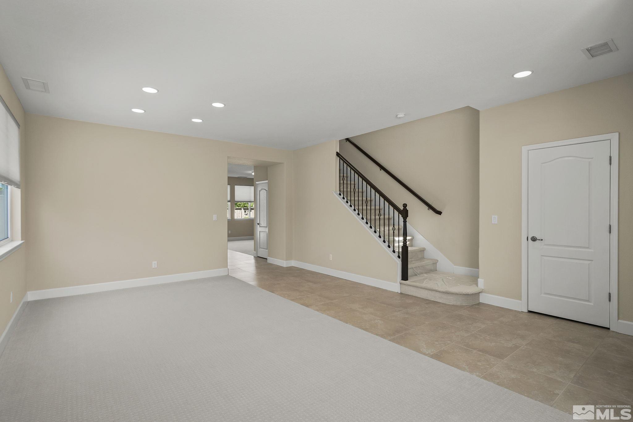 10819 Walnut Ridge Drive Reno, NV 89521 - Photo 16 of 22 a view of an empty room with stairs