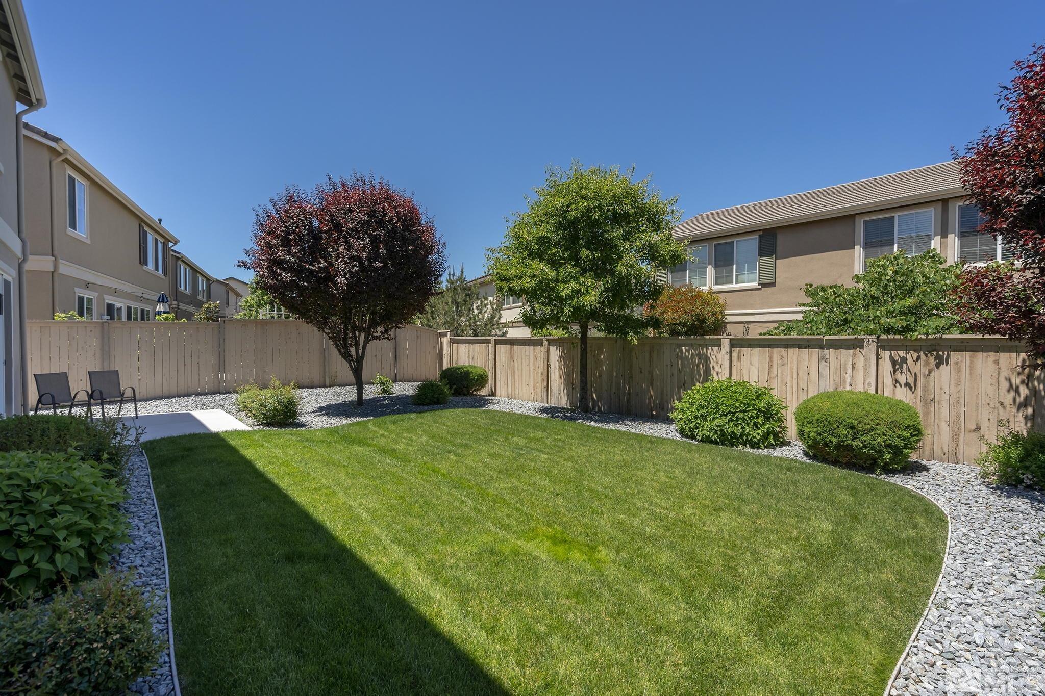 10819 Walnut Ridge Drive Reno, NV 89521 - Photo 10 of 22 a view of back yard of house with green space