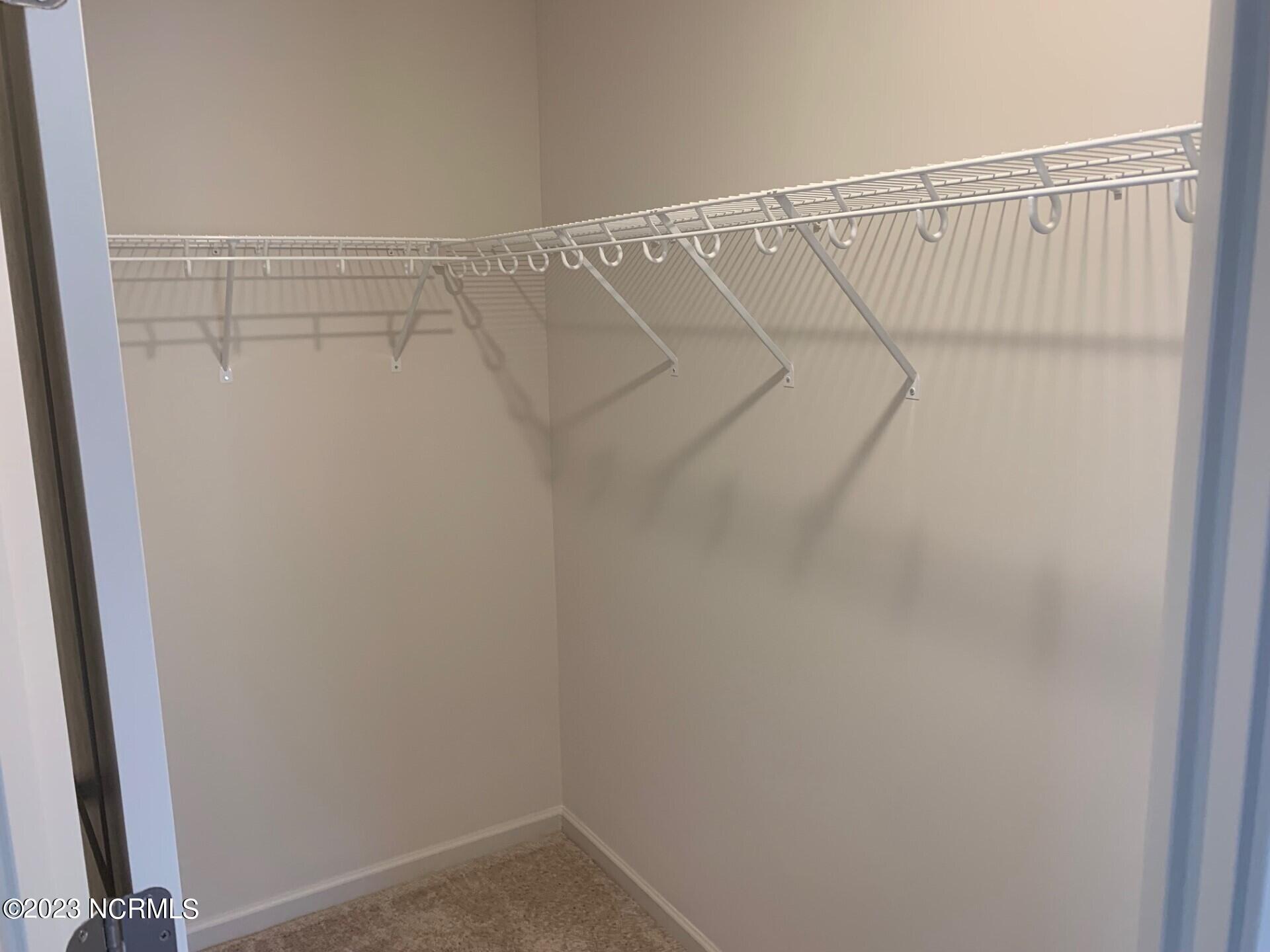 121 Cougar Road Southport, NC 28461 - Photo 13 of 15 Highland MB Walk in closet