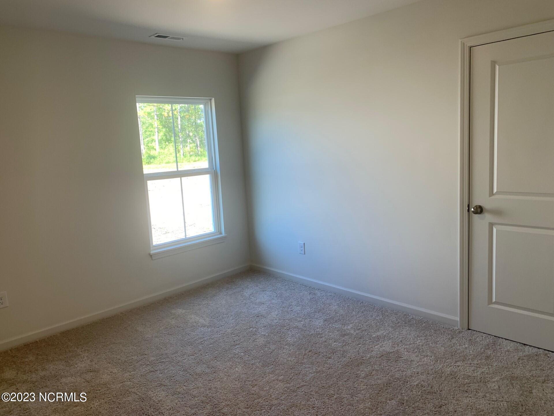 121 Cougar Road Southport, NC 28461 - Photo 5 of 15 Highland Bedroom 1