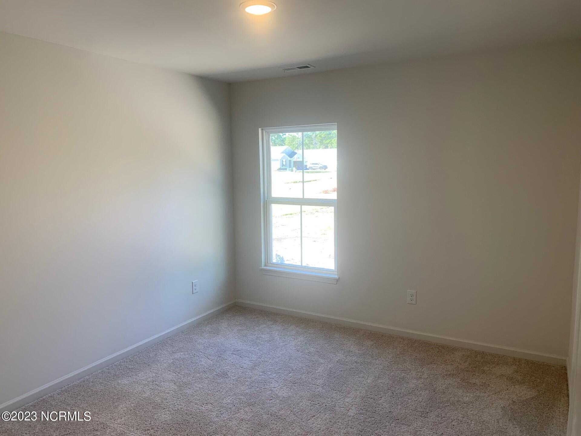 121 Cougar Road Southport, NC 28461 - Photo 6 of 15 Highland bedroom 2
